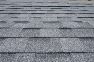 A close up of a shingled roof by NorCal Roofing & Gutters