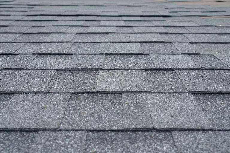 A close up of a shingled roof by NorCal Roofing & Gutters