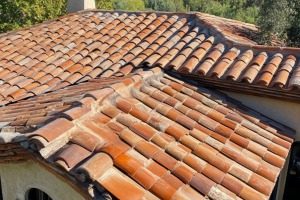 Red roofing completed by NorCal Roofing & Gutters