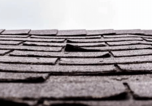 Damaged roof of a house showing the early detection of roof repair in Stockton and Roseville, CA.